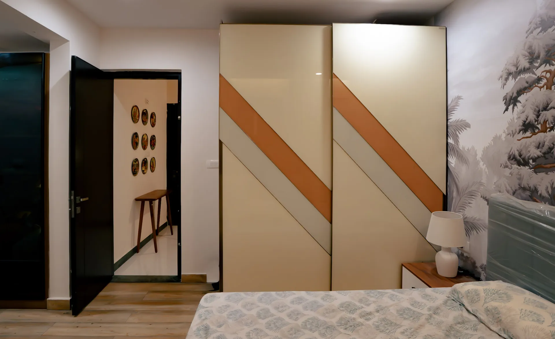 Sliding wardrobe with glossy cream, terracotta and pale-blue diagonal shutters, villa at SVS Silver Oaks, Heelalige