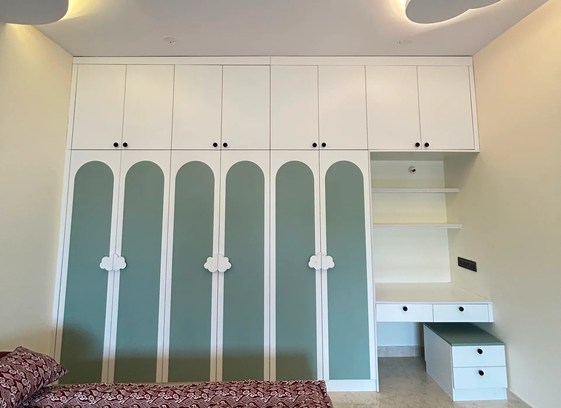 Arch-panel wardrobe with integrated study unit and green accent doors — completed Elvenwood project